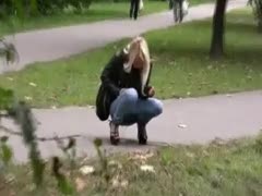 Blonde cutie Kate pees in her jeans in a public place